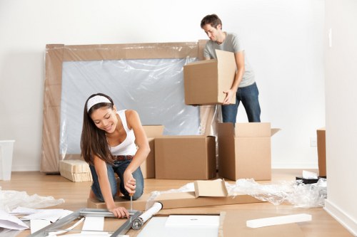 House movers planning a local move in Purley with packing boxes and furniture