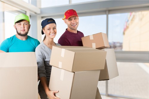 Removal van and moving boxes prepared for a Purley home move