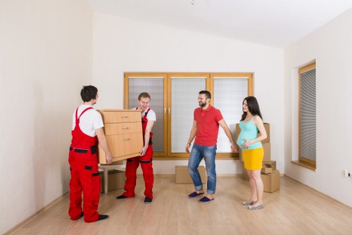 Furniture and boxes prepared for a Purley house move with van support