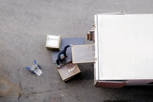 Loading furniture into a van near Purley homes
