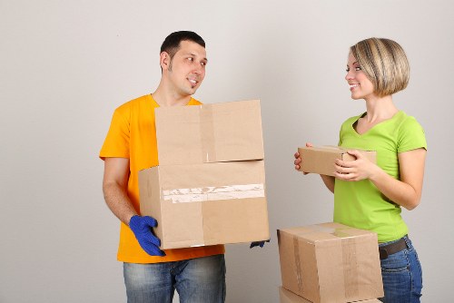 Van and helper providing moving support in Purley